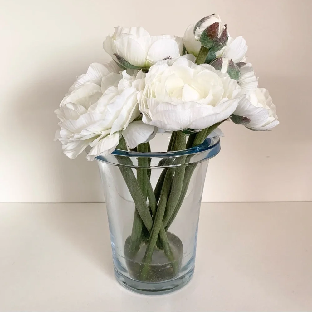 Thomas O’Brien Faux flowers in blue glass vase